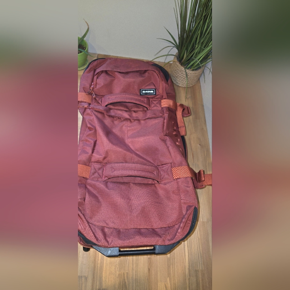 Dakine Red Rolling Luggage Bag